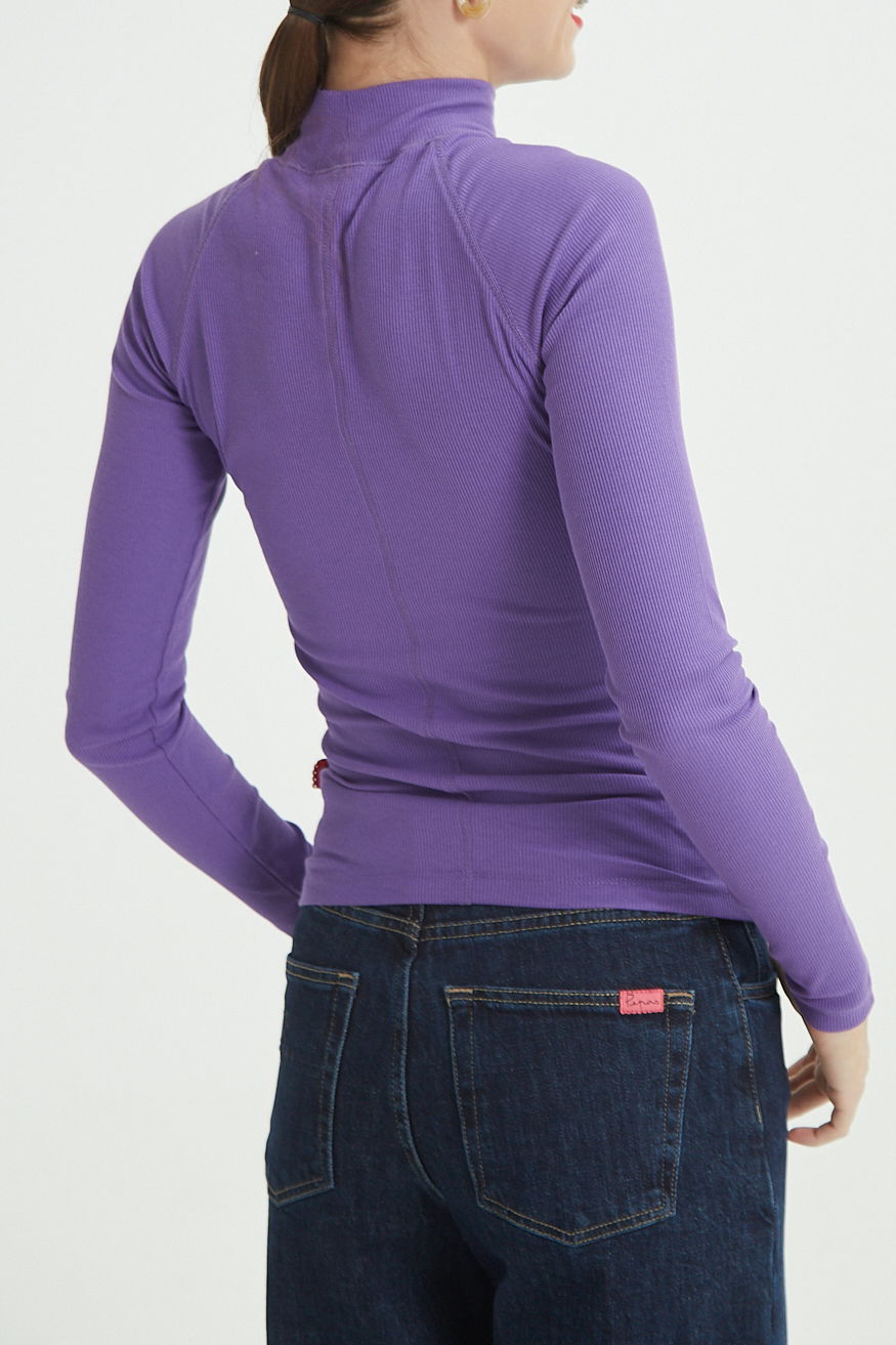 POLERA WARNER