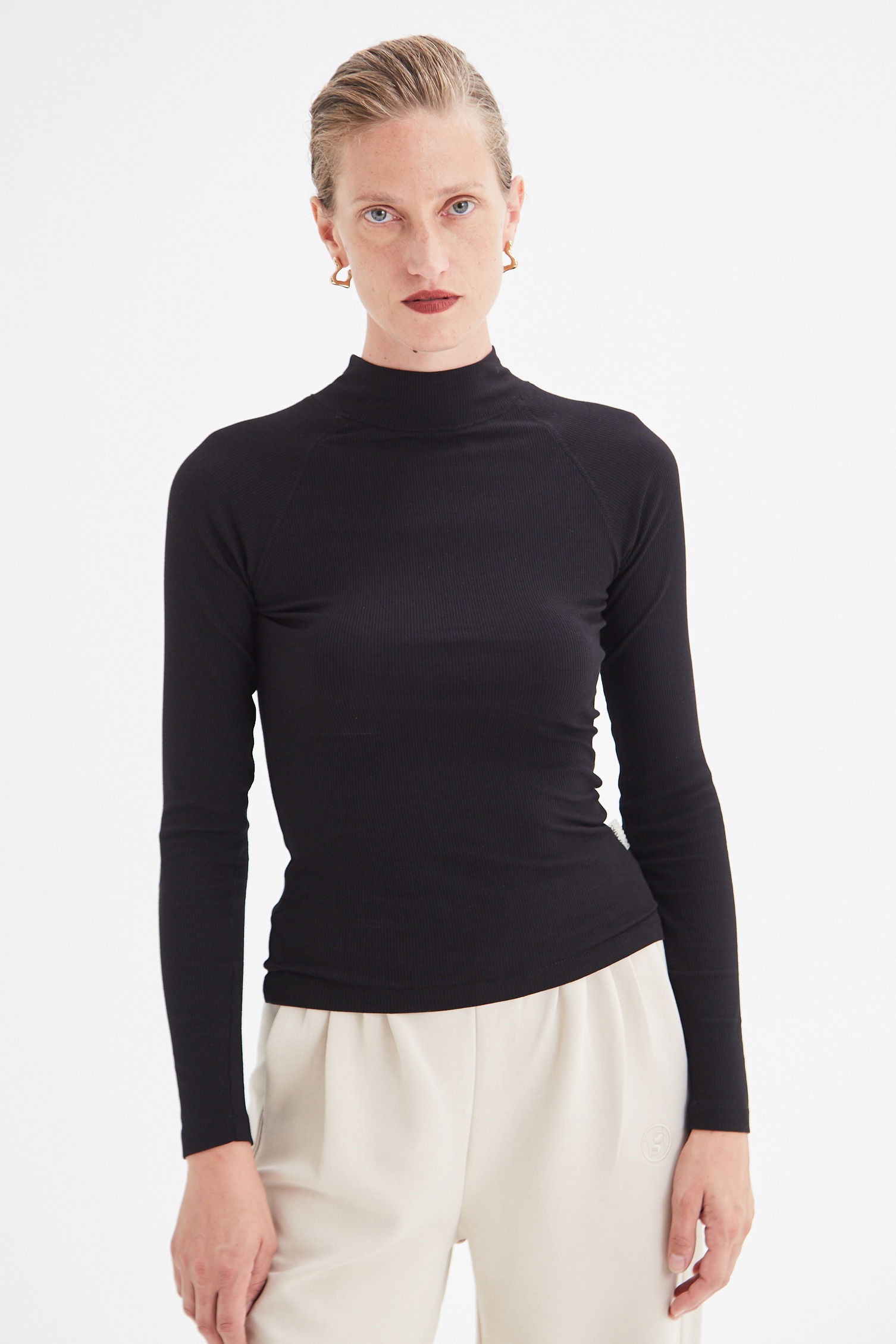 POLERA WARNER