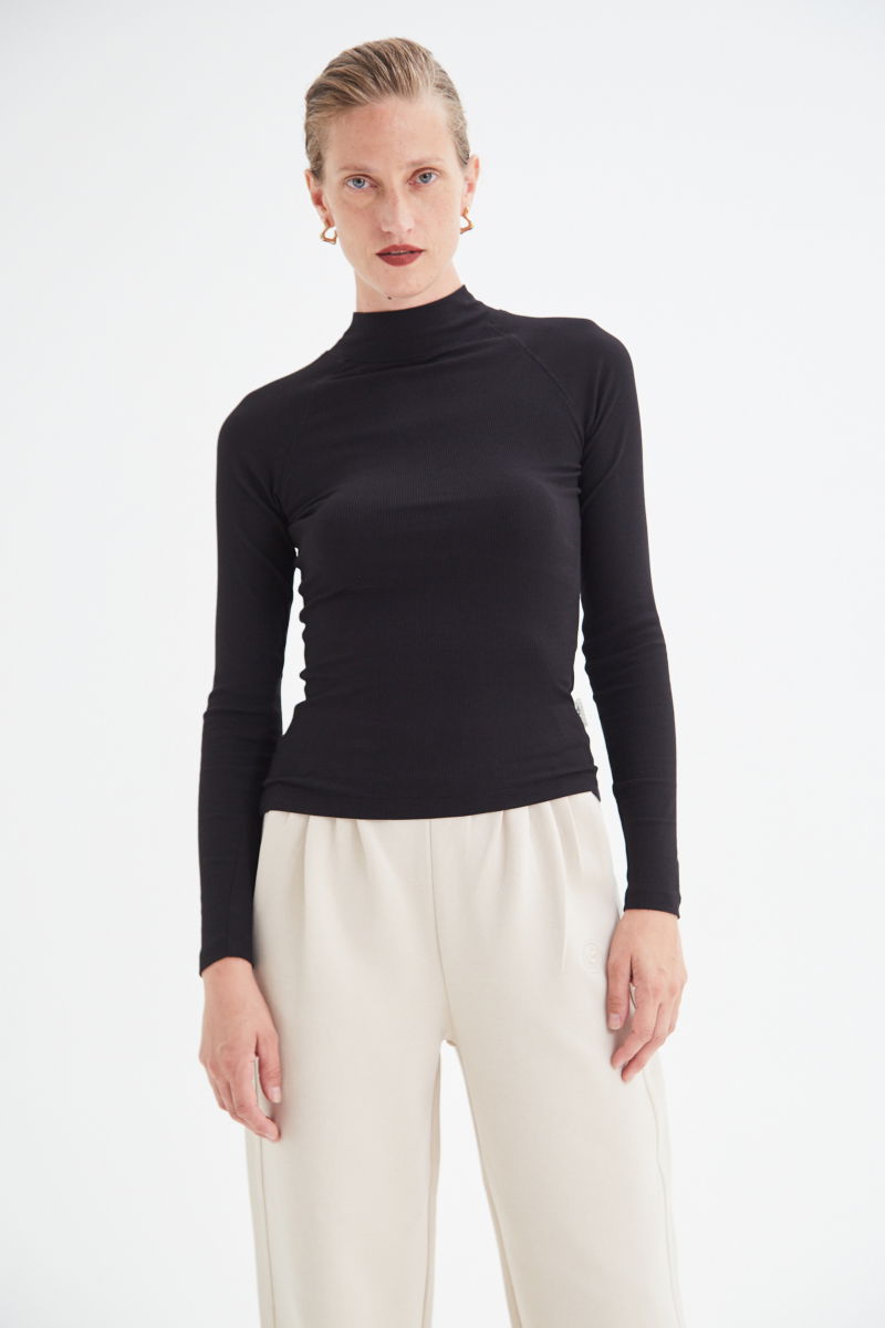 POLERA WARNER