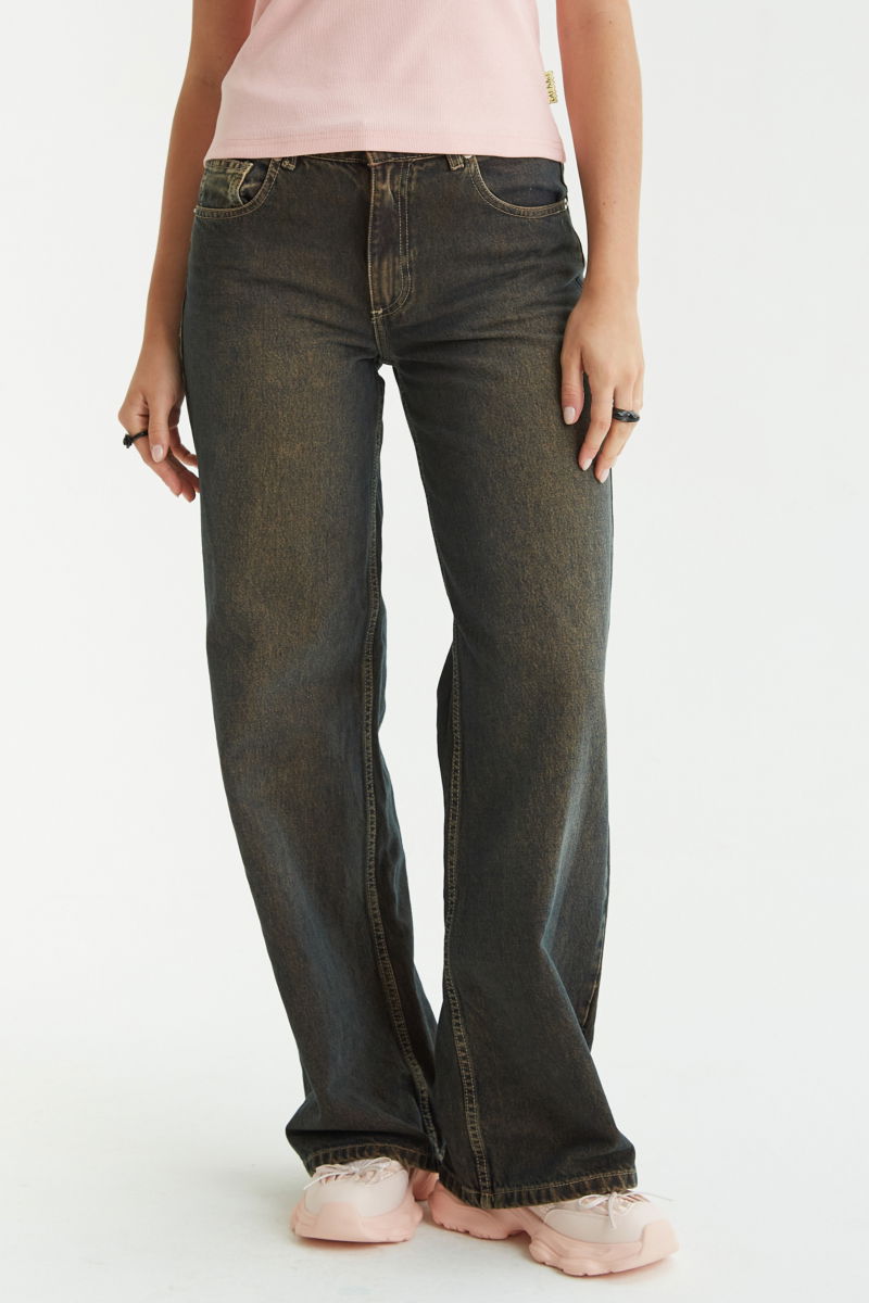 Jean wide leg tiro alto de denim rigido en color ocre. 